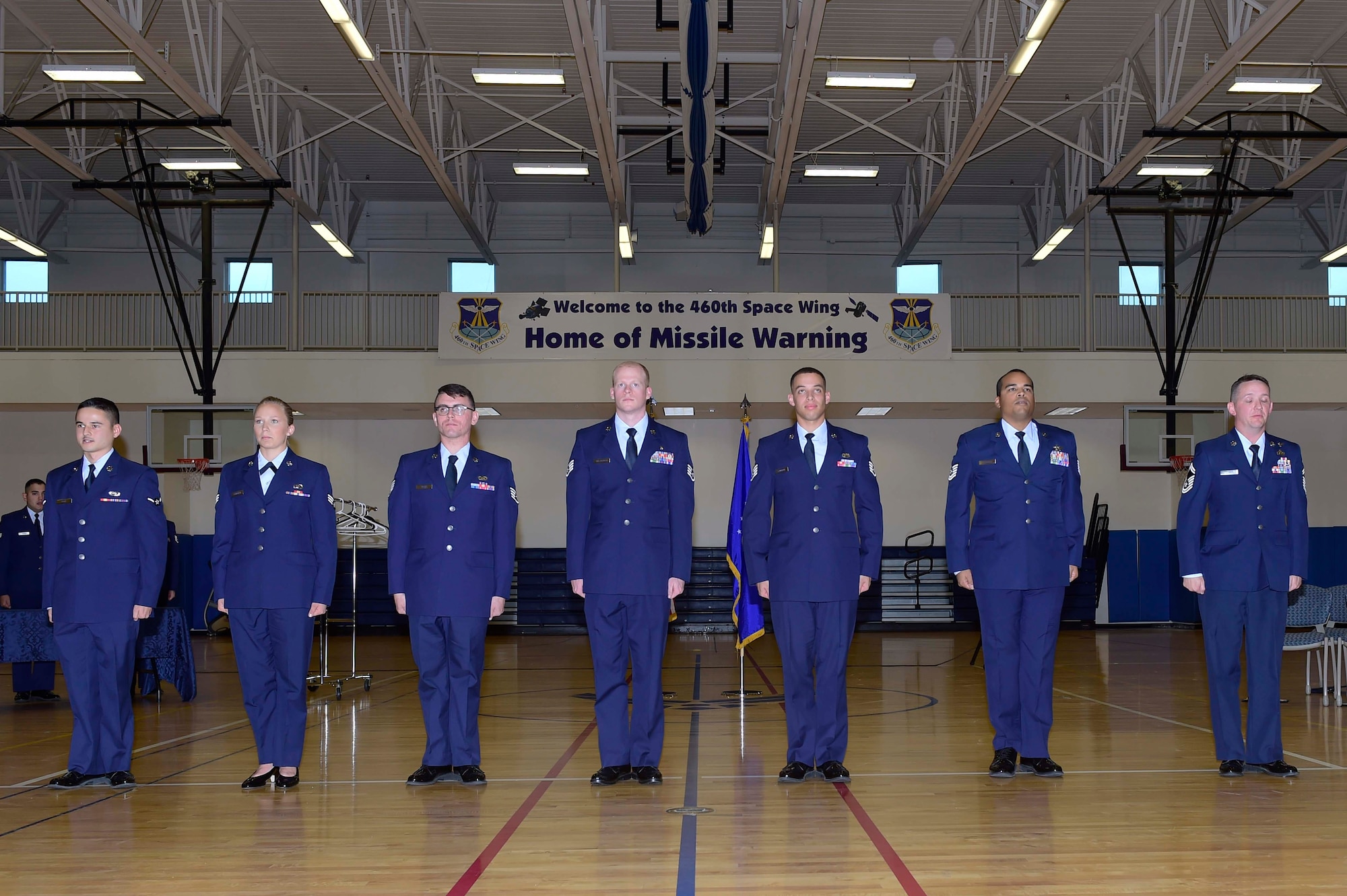 Seven members of Team Buckley were promoted to their next ranks Oct. 30, 2015, at the fitness center on Buckley Air Force Base, Colo. A promotion ceremony is a time-honored tradition in the Air Force, allowing co-workers, family and friends to support and congratulate Airmen on their promotion. (U.S. Air Force photo by Staff Sgt. Stephany Richards/Released)