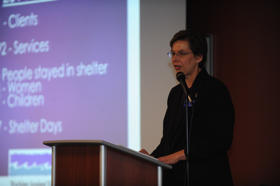 Mary Corbine, Working Against Violence, Inc. executive director, speaks at a Purple Ribbon Luncheon to increase awareness of domestic violence at Ellsworth Air Force Base, S.D., Oct. 27, 2015. Founded in 1978, WAVI works in the Black Hills region to foster a community free of domestic violence and sexual assault. (U.S. Air Force photo by Airman Sadie Colbert/Released)