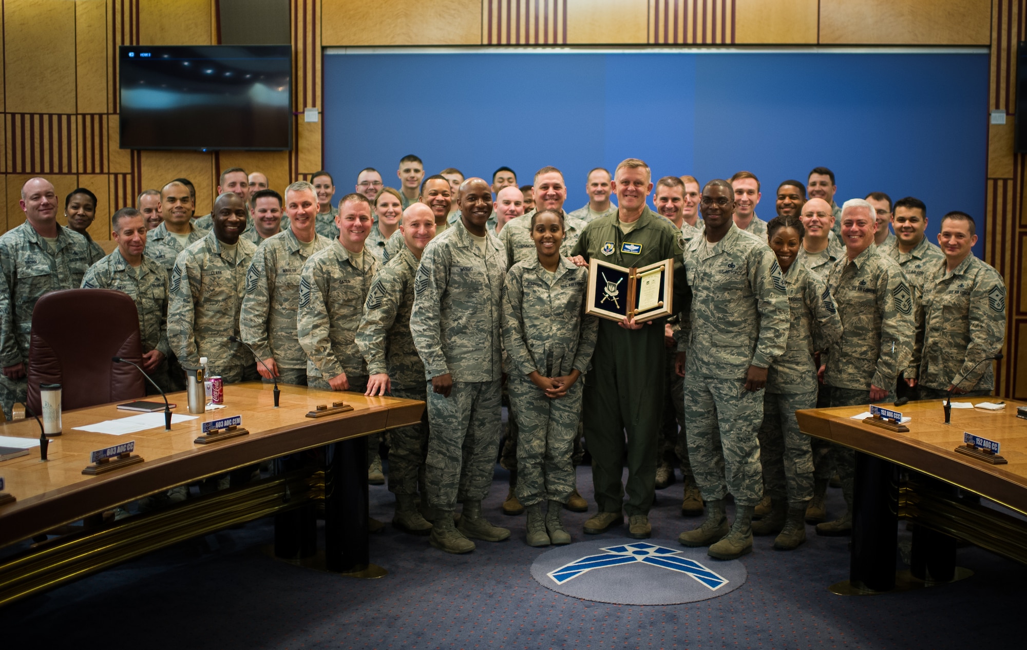General Frank Gorenc, U.S. Air Forces in Europe and Air Forces Africa commander, poses for a group photo with command chiefs and enlisted Airmen from across USAFE-AFAFRICA after being nominated for induction into the USAFE-AFAFRICA Order of the Sword at Ramstein Air Base, Germany Oct. 29, 2015. The Order of the Sword is an honor within the U.S. Air Force. It is a program which non-commissioned officers of a command recognize individuals they hold in high esteem and wish to honor. (U.S. Air Force photo/ Tech. Sgt. Ryan Crane)