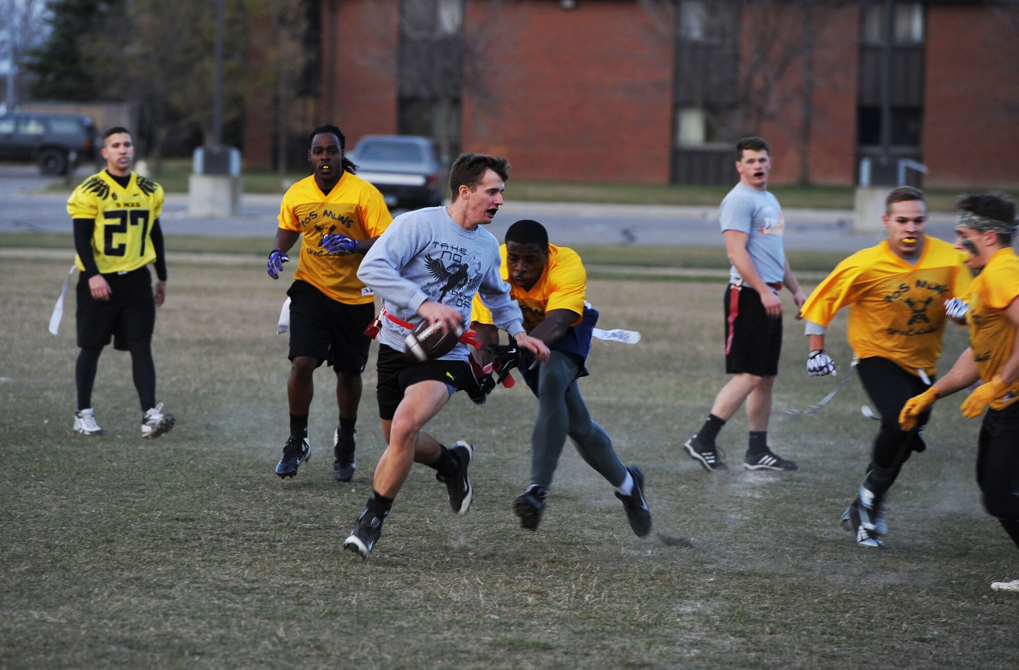 The 91st Missile Security Forces Squadron team recently won the Minot AFB Flag Football Championship, Oct. 19, 2015 at Minot Air Force Base, N.D. The team cruised through the championship game with a 56-18 win over the 705th Munitions Squadron team. The flag football program has been going on at Minot AFB for years as a way to build morale and for Airmen to come together and learn how to work together as a team, on and off the field. Win or lose the flag football program is all in good fun and faith. (U.S. Air Force photos/Senior Airman Kristoffer Kaubisch)
