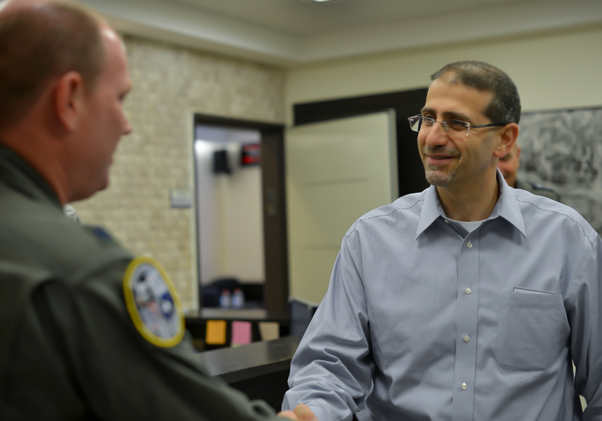 U.S. Ambassador to Israel, Daniel Shapiro, meets with Lt. Col. John
Stratton, 493rd Fighter Squadron commander, at Uvda Air Force Base, Israel,
Oct. 26, 2015. Ambassador Shapiro visited U.S. participants in the Israeli
air force's Blue Flag exercise, which provides an opportunity for the IAF to
train with their allies and strengthen bonds between partner nations. (U.S.
Air Force photo by 2nd Lieutenant Kellie Rizer/Released)
