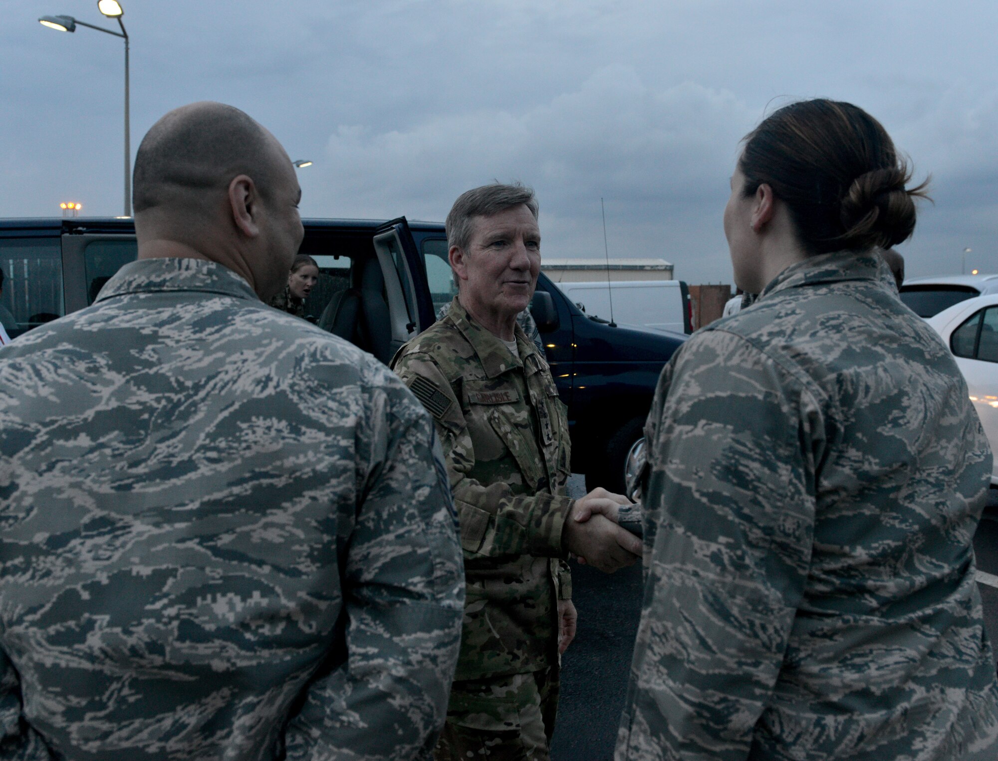 U.S. Air Force Gen. Hawk Carlisle, commander of Air Combat Command, visits with service members staying at Patriot Village during a base visit Oct. 22, 2015, at Incirlik Air Base, Turkey. Patriot Village houses both U.S. and NATO Service members that are deployed to Incirlik AB. (U.S. Air Force photo by Senior Airman Michael Battles/Released)