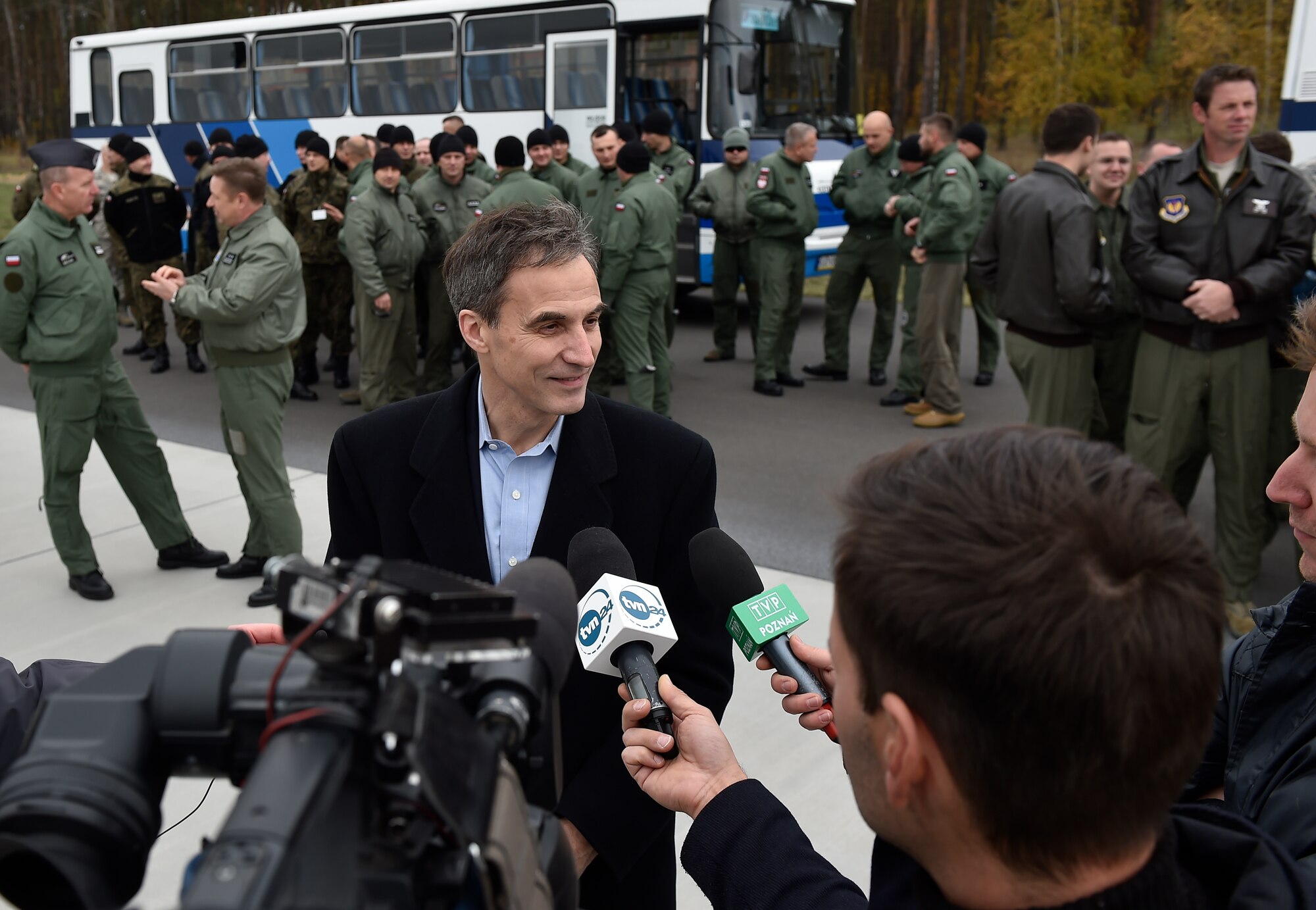 U.S. Ambassador to Poland Paul W. Jones answers media questions during his visit to Powidz Air Base, Poland, Oct. 29, 2015. Jones had the opportunity to meet with both U.S. and Polish air force leaders to discuss the countries’ growing partnership. The ambassador was also able to watch his first airlift competition, where C-130s from three different squadrons performed airdrops and landings. (U.S. Air Force photo/Senior Airman Damon Kasberg)