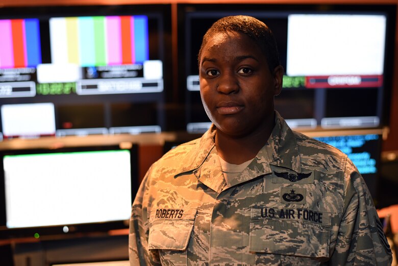 MCGHEE TYSON AIR NATIONAL GUARD BASE, Tenn. - Tech Sgt. Chalanda Roberts poses for a photo Nov. 2, 2015, inside the broadcast control room at the I.G. Brown Training and Education Center. Roberts served for five years as a regular Air Force technical director for the Air National Guard's satellite enlisted professional military education. (U.S. Air National Guard photo by Master Sgt. Mike R. Smith/Released)