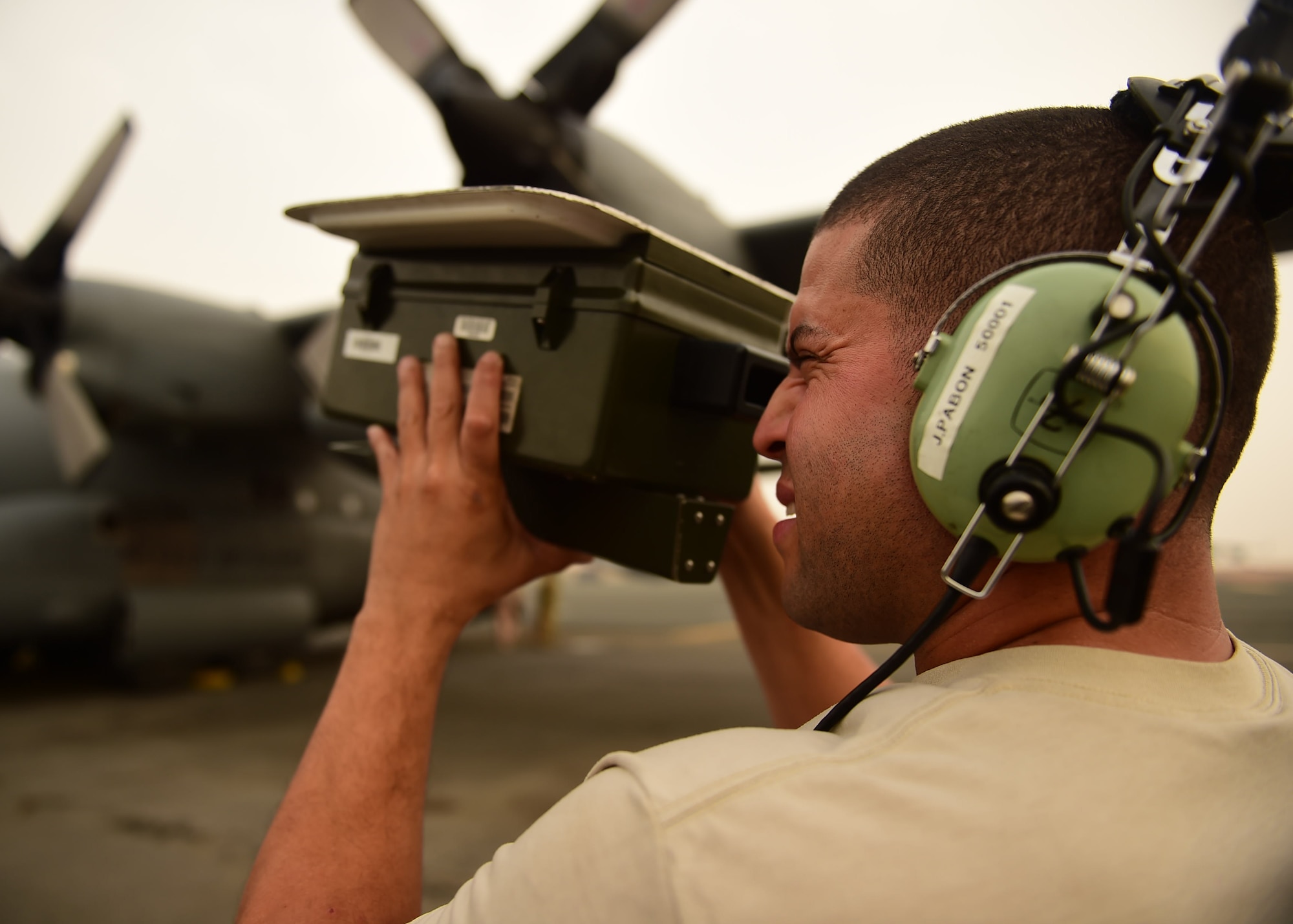 Tech. Sgt. Josue Pabon, 386th Expeditionary Aircraft Maintenance Squadron engine mechanic, conducts pre-flight checks prior to takeoff at an undisclosed location in Southwest Asia, Oct. 29, 2015. Pabon and the rest of the maintenance crew ensure the aircraft is mechanically sound for the duration of the mission. (U.S. Air Force photo by Staff Sgt. Jerilyn Quintanilla)  