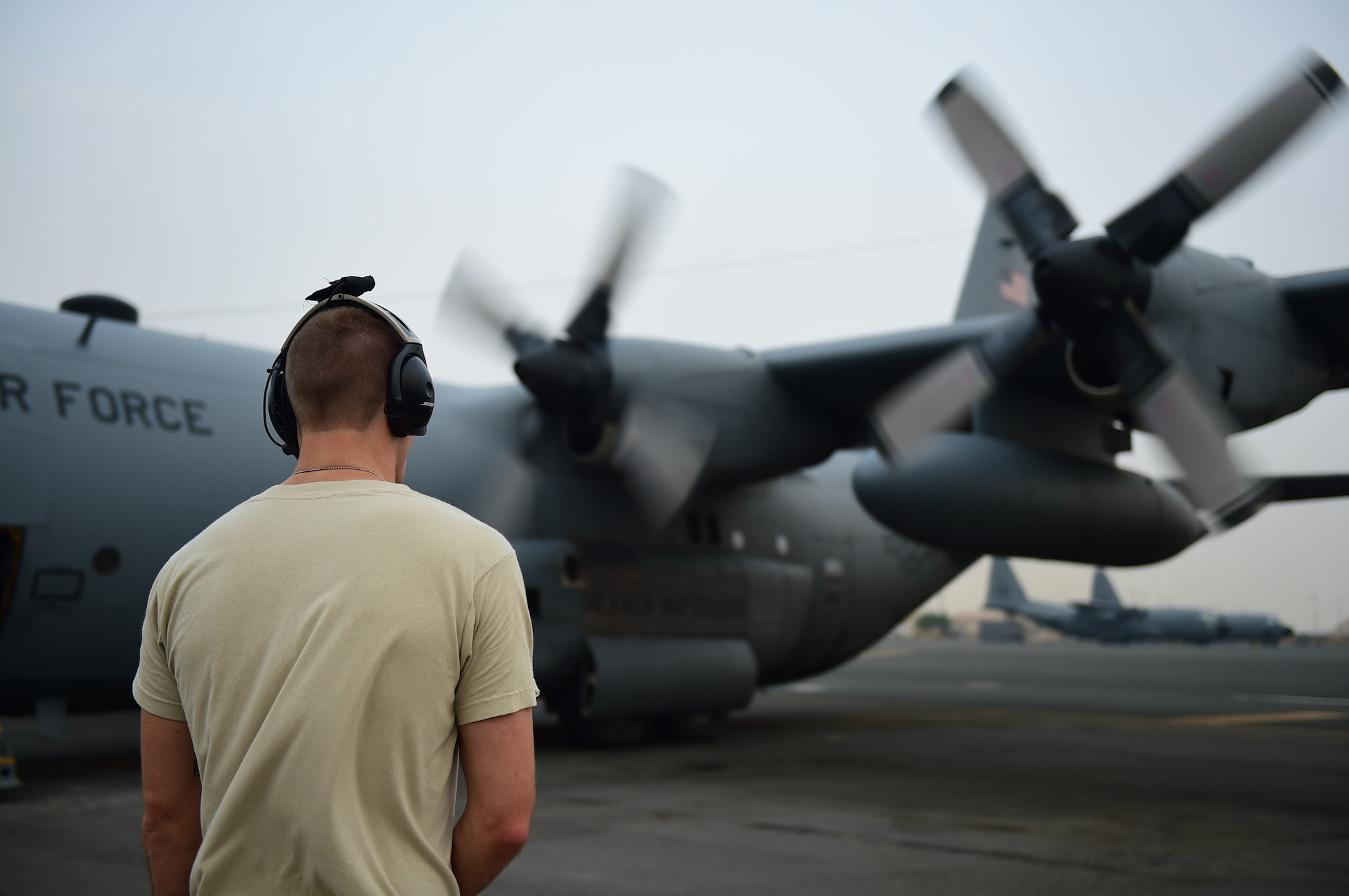 Senior Airman Aaron Hayes, 737th Expeditionary Airlift Squadron loadmaster, conducts pre-flight checks at an undisclosed location in Southwest Asia, Oct. 29, 2015. The 737th EAS mission is to provide airlift support throughout the area of responsibility for Operation INHERENT RESOLVE. (U.S. Air Force photo by Staff Sgt. Jerilyn Quintanilla)