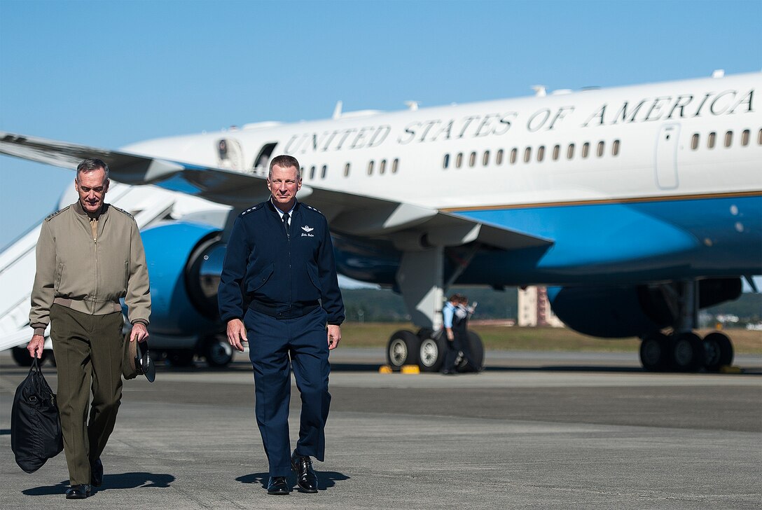 U.S. Marine Corps Gen. Joseph F. Dunford Jr., left, chairman of the Joint Chiefs of Staff, walks with U.S. Air Force Lt. General John L. Dolan, commander, U.S. Forces Japan, after arriving on Yokota Air Base in Tokyo, Nov. 3, 2015. DoD photo by U.S. Navy Petty Officer 2nd Class Dominique A. Pineiro