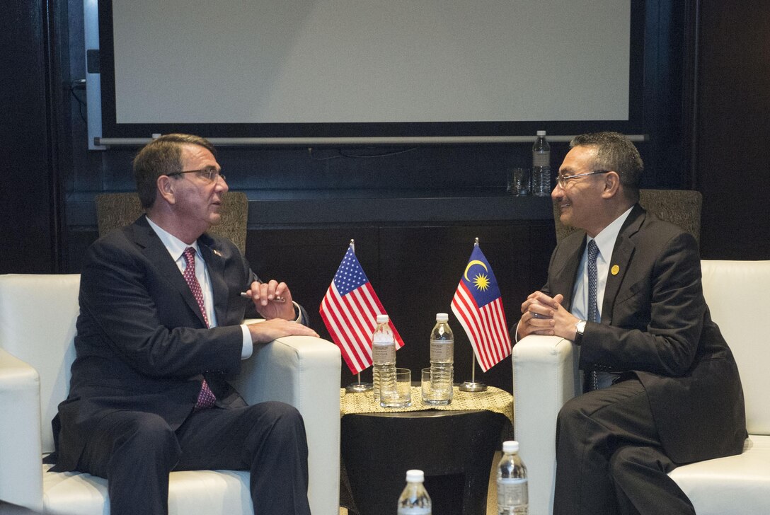 U.S. Defense Secretary Ash Carter discusses matters of mutual importance during the Association of Southeast Asian Nations Defense Ministers Meeting Plus in Kuala Lumpur, Malaysia, Nov. 3, 2015. Carter plans to meet with leaders from more than a dozen nations across East Asia and South Asia to help advance the next phase of the U.S. military’s rebalance in the region by modernizing longtime alliances and building new partnerships. DoD photo by U.S. Air Force Senior Master Sgt. Adrian Cadiz