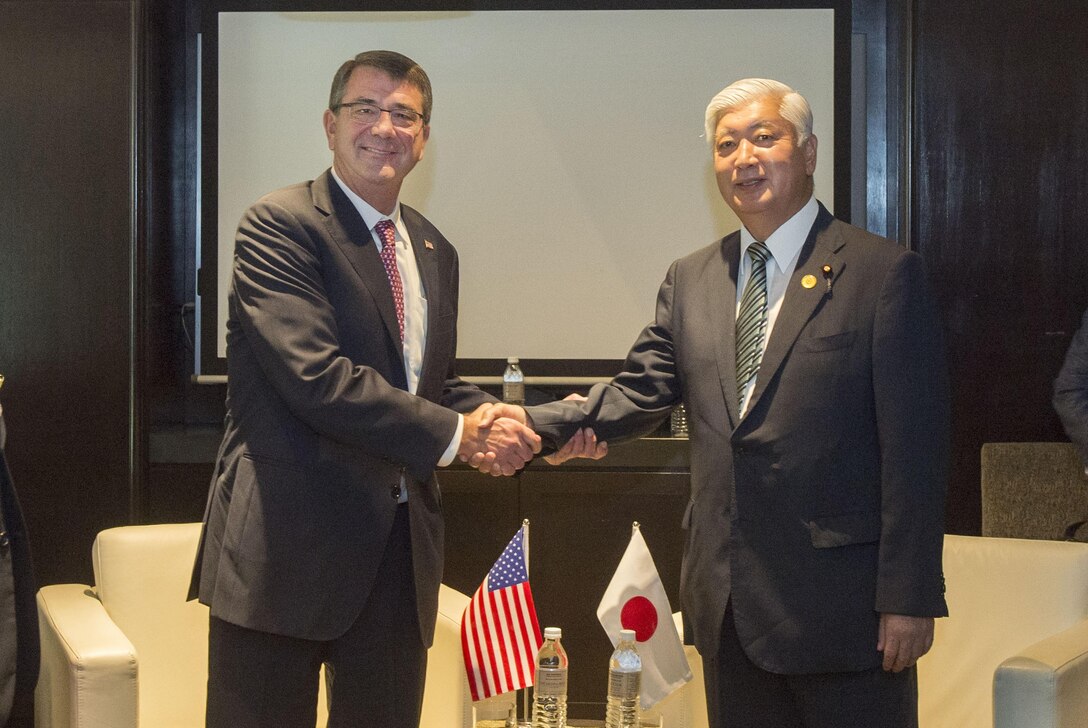 U.S. Defense Secretary Ash Carter stands for a photo with Japanese Defense Minister Gen Nakatani as they meet to discuss matters of mutual interest during the Association of Southeast Asian Nations Defense Ministers' Meeting – Plus in Kuala Lumpur, Malaysia, Nov. 3, 2015. DoD photo by Air Force Senior Master Sgt. Adrian Cadiz