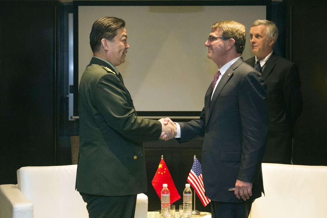 U.S. Defense Secretary Ash Carter exchanges greetings with Chinese Defense Minister Gen. Chang Wanquan before meeting to discuss matters of mutual interest during the Association of Southeast Asian Nations Defense Ministers' Meeting – Plus in Kuala Lumpur, Malaysia, Nov. 3, 2015. DoD photo by Air Force Senior Master Sgt. Adrian Cadiz