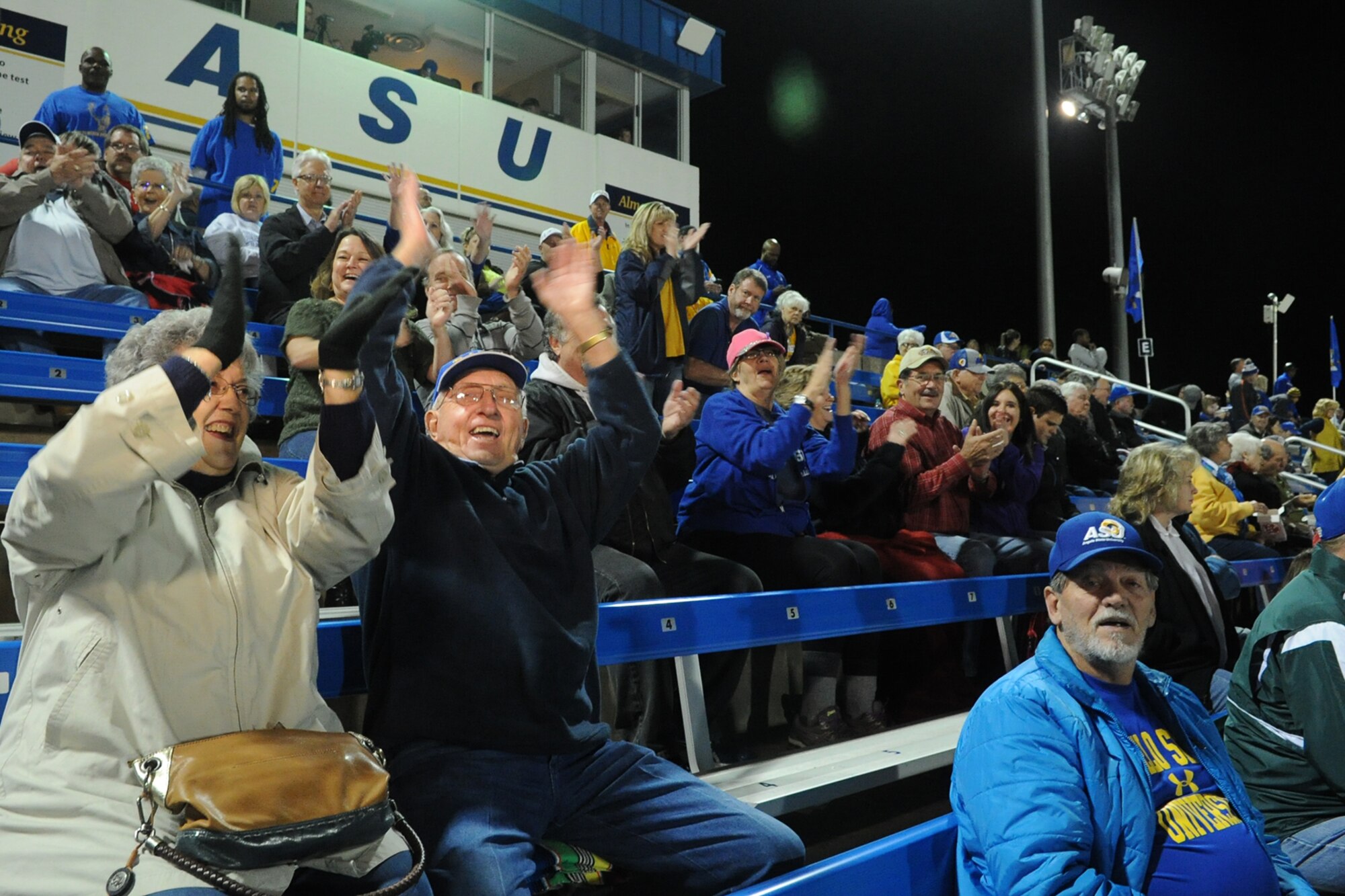 Angelo State University fans cheer during ASU’s Military Appreciation Day football game at the LeGrand Stadium, San Angelo, Texas, Oct. 31, 2015. The ASU Rams beat Tarleton State Texans 57-24. (U.S. Air Force photo by Staff Sgt. Laura R. McFarlane/Released)