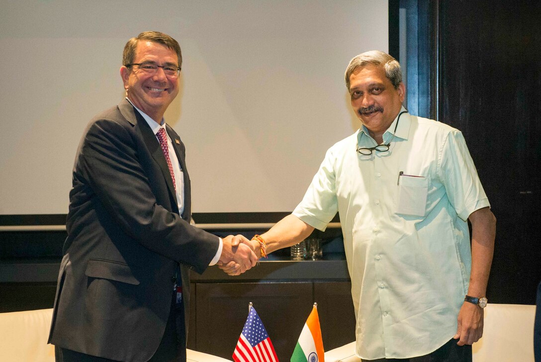 U.S. Defense Secretary Ash Carter stands for a photo with Indian Defense Minister Manohar Parrikar before meeting to discuss matters of mutual interest during the Association of Southeast Asian Nations Defense Ministers' Meeting – Plus in Kuala Lumpur, Malaysia, Nov. 3, 2015. DoD photo by Air Force Senior Master Sgt. Adrian Cadiz