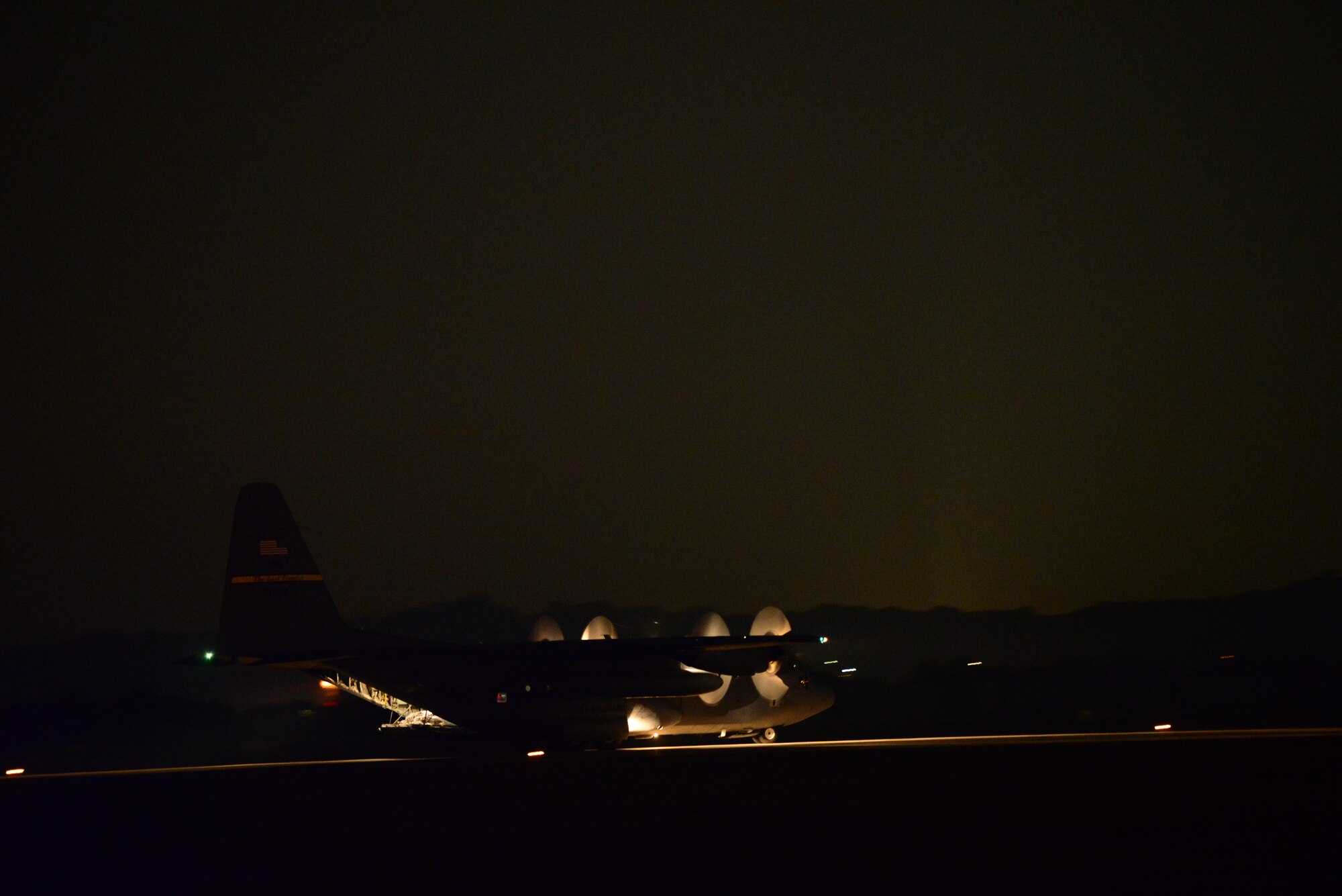A C-130 Hercules from the 176th Wing, Kadena Air Base, Japan, taxis down the runway of Osan Air Base, Republic of Korea, Nov. 2, 2015. The C-17 is at Osan to take part in Vigilant Ace 16, a  peninsula-wide readiness exercise focused on strengthening the ROK and U.S. alliance. (U.S. Air Force photo/Staff Sgt. Amber Grimm)