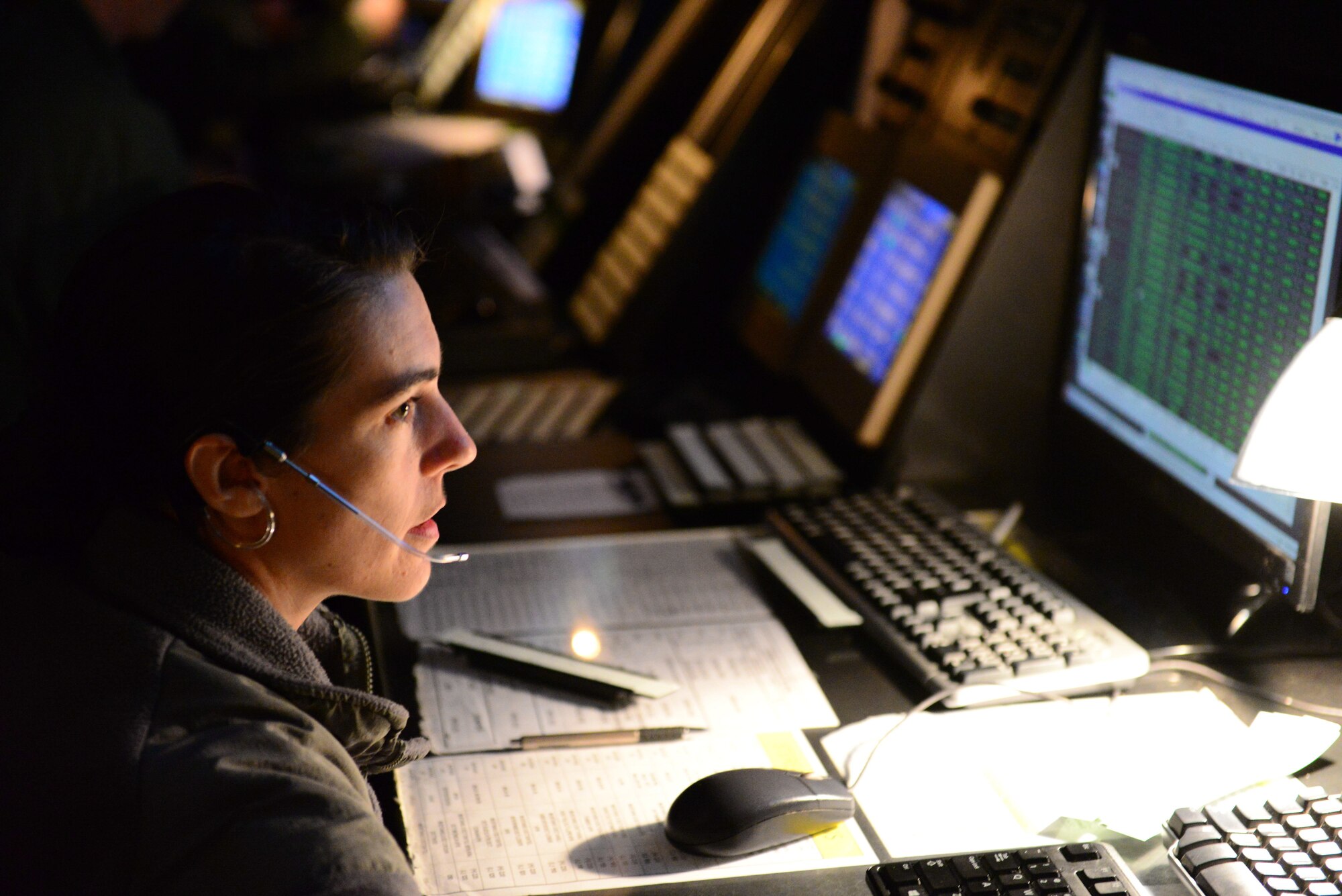 Staff Sgt. Andrea Clark, 51st Operations Support Squadron air traffic controller, monitors incoming and outgoing air traffic during Vigilant Ace 16 at Osan Air Base, Republic of Korea, Nov. 2, 2015. Osan air traffic controller's exercise and real-world operations are vital to the safe conduct of all aircraft, both military and civilian, occupying the airspace in and around Osan and Suwon. (U.S. Air Force photo/Staff Sgt. Amber Grimm)