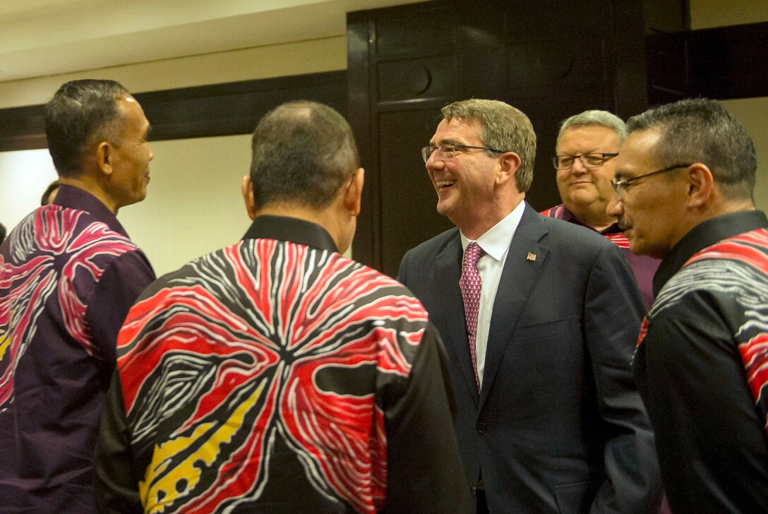 U.S. Defense Secretary Ash Carter talks with defense officials during a reception at the Association of Southeast Asian Nations Defense Ministers' Meeting – Plus in Kuala Lumpur, Malaysia, Nov. 3, 2015. DoD photo by Air Force Senior Master Sgt. Adrian Cadiz