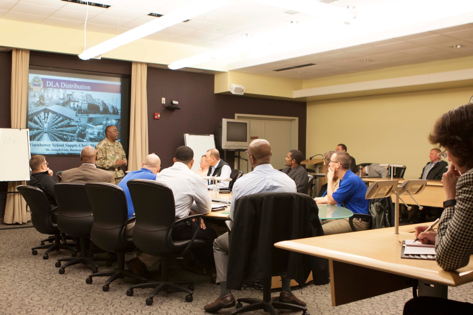DLA Distribution commander Army Brig. Gen. Richard Dix discusses DLA Distribution’s core competencies with students from the Dwight D. Eisenhower School for National Security and Resource Strategy.