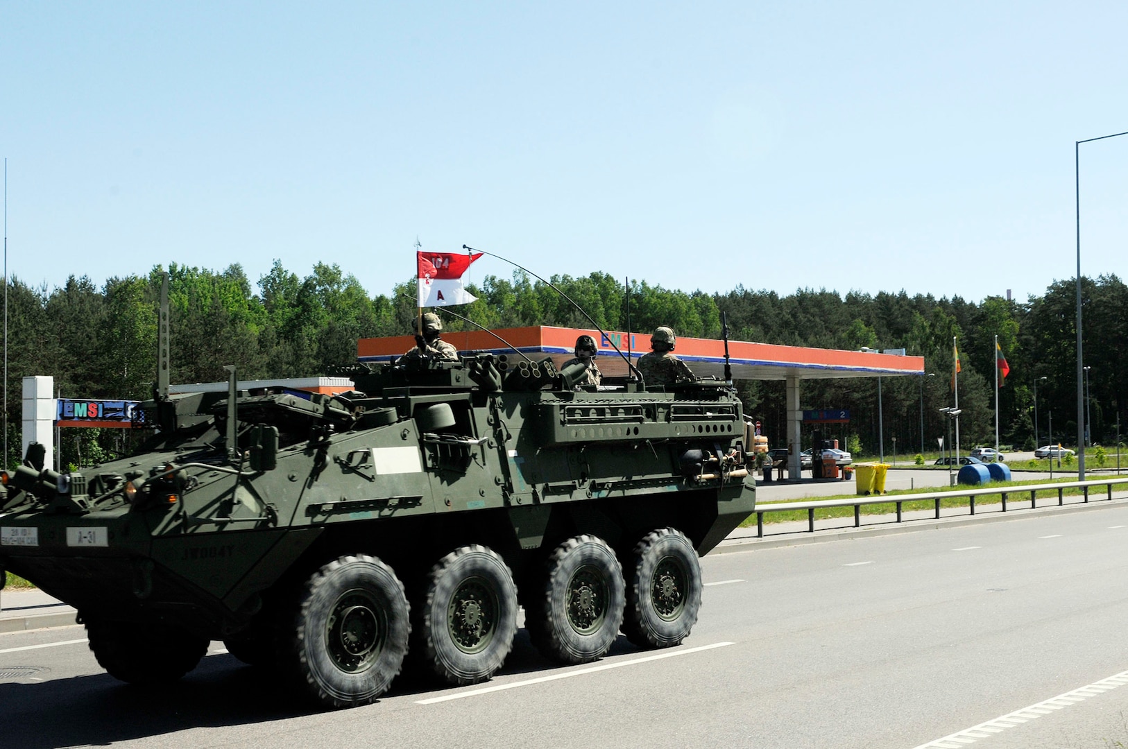 A Stryker vehicle from the 56th Stryker Brigade Combat Team passes a gas station north of Vilnius enroute to Rukla. A platoon of soldiers from the 28th Infantry Division unit from Hazleton, Pennsylvania, will spend two weeks training in the Saber Strike 2015 exercise. Saber Strike is a long-standing U.S. Army Europe-led cooperative training exercise. Projected changes to National Guard units will lead to conversion of some, including the 81st Armored Brigade Combat Team, which is slated to transition to a Stryker brigade combat team in 2017.