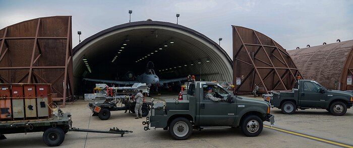 Weapons load crew team Airmen from the 25th Aircraft Maintenance Unit prepare to load munitions onto A-10 Thunderbolt IIs during the Vigilant Ace 16 exercise on Osan Air Base, Republic of Korea, Nov. 1, 2015. The munitions Airmen can load up to 16,000 pounds of mixed ordnance onto the A-10 airframe. The A-10 is powered by two General Electric TF34-GE-100 turbofan engines producing 9,065 pounds of thrust each, and the A-10 is capable  of reaching speeds of 450 nautical miles per hour. 