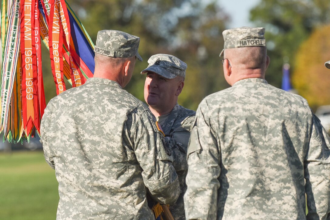 Incoming command sergeant major, Command Sgt. Maj. James Peter Matthews, receives the command’s colors from Brig. Gen. Scott Morcomb in his first official act as the 11th Theater Aviation Command’s command sergeant major during the Change of Responsibility Ceremony held at Fort Knox, Ky. on October 18. Command Sgt. Maj. James Peter Matthews took the helm as the senior enlisted soldier from Command Sgt. Maj. Steven Hatchell. The 11th Theater Aviation Command (TAC) is the only aviation command in the Army Reserve. The 11th TAC has two missions, functioning as both a warfighting headquarters and as a functional command. As warfighting command, the 11th TAC provides command & control, staff planning, and supervision for two aviation brigades and one air traffic service battalion. As a functional command the 11th TAC provides command and control for all Army Reserve Aviation. (Photos by Renee Rhodes / Fort Knox Visual Information)