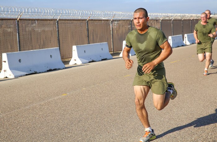 Private Michael T. Gonzalez, Platoon 3202, India Company, 3rd Recruit Training Battalion, conducts a three-mile run during a final physical fitness test at Marine Corps Recruit Depot San Diego, Oct. 22. Gonzalez is a Vidor, Texas, native and wanted to make his family proud by becoming a Marine. Today, all males recruited from west of the Mississippi are trained at MCRD San Diego. The depot is responsible for training more than 16,000 recruits annually. India Company graduated Nov. 6.