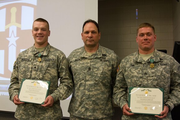 The winners of the 807th Medical Command Best Warrior competition are Spec. Tobias MacDonald of the 330th Medical Brigade won the junior enlisted competition and Staff Sgt. Andrew Fink won a member of the 409th Area Medical Support Company, 307th Medical Brigade won the noncommissioned officer category.  These two Soldiers will compete for the title of best warrior at the U.S. Army Reserve competition at Fort Bragg, N.C. in May. (U.S. Army Photo by Sgt. 1st Class Adam Stone)