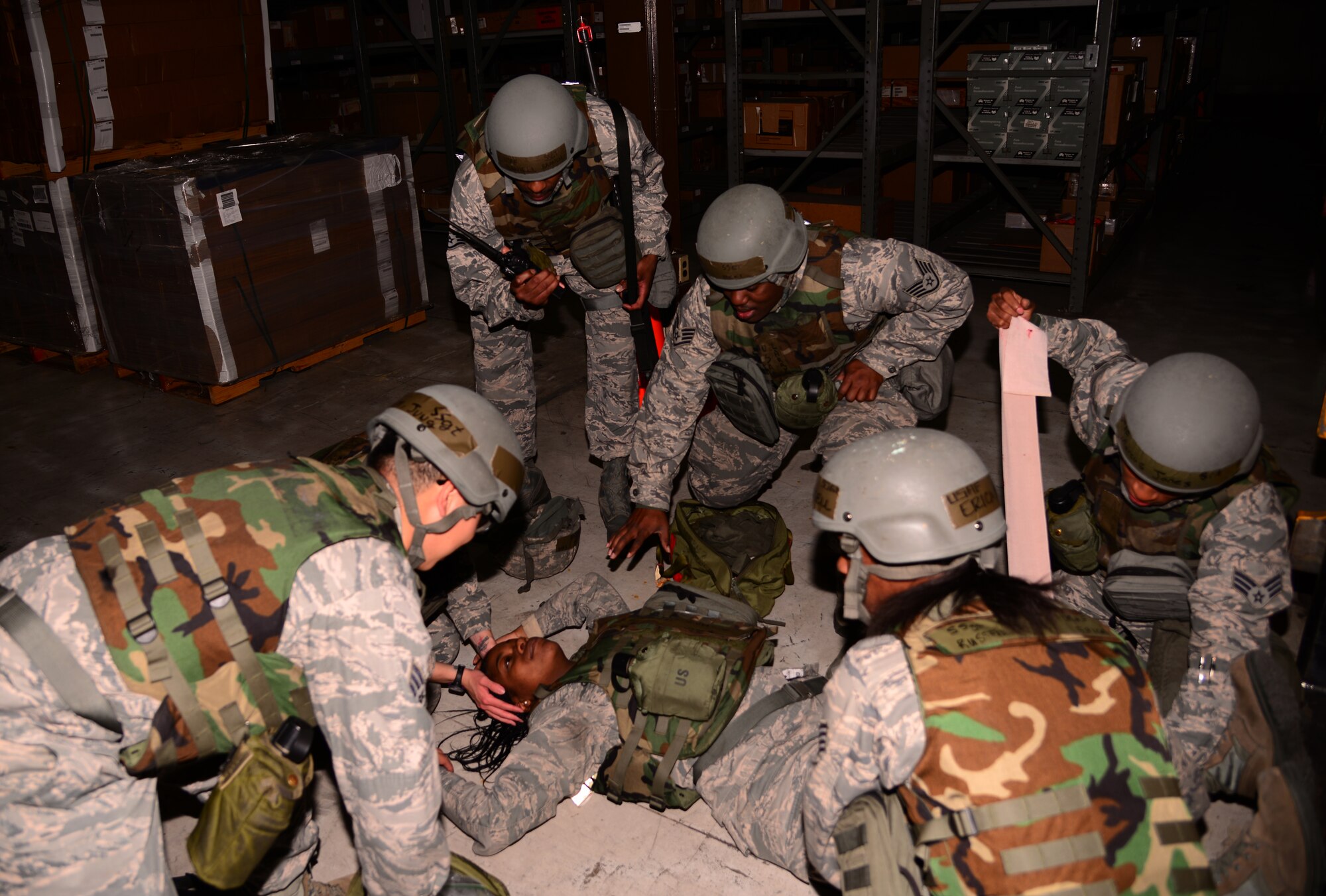 Members of the 51st Logistics Readiness Squadron materials management flight perform Self-Aid Buddy Care on a fellow Airman Nov. 2, 2015, at Osan Air Base, Republic of Korea. The Airmen are participating in the annual exercise Vigilant Ace 16 which tests the capabilities of units and assists in preparing members of the alliance to respond to potential scenarios. (U.S. Air Force photo/Staff Sgt. Benjamin Sutton)