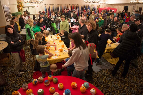 Icemen and their families gather in the Yukon Club during the Fall Festival on Oct. 28, 2015, at Eielson Air Force Base, Alaska. The Fall Festival kicked off the “Winter-vention” campaign created by the 354th Force Support Squadron to help get Airmen and their families out and about throughout the winter. (U.S. Air Force photo by Staff Sgt. Joshua Turner/Released)