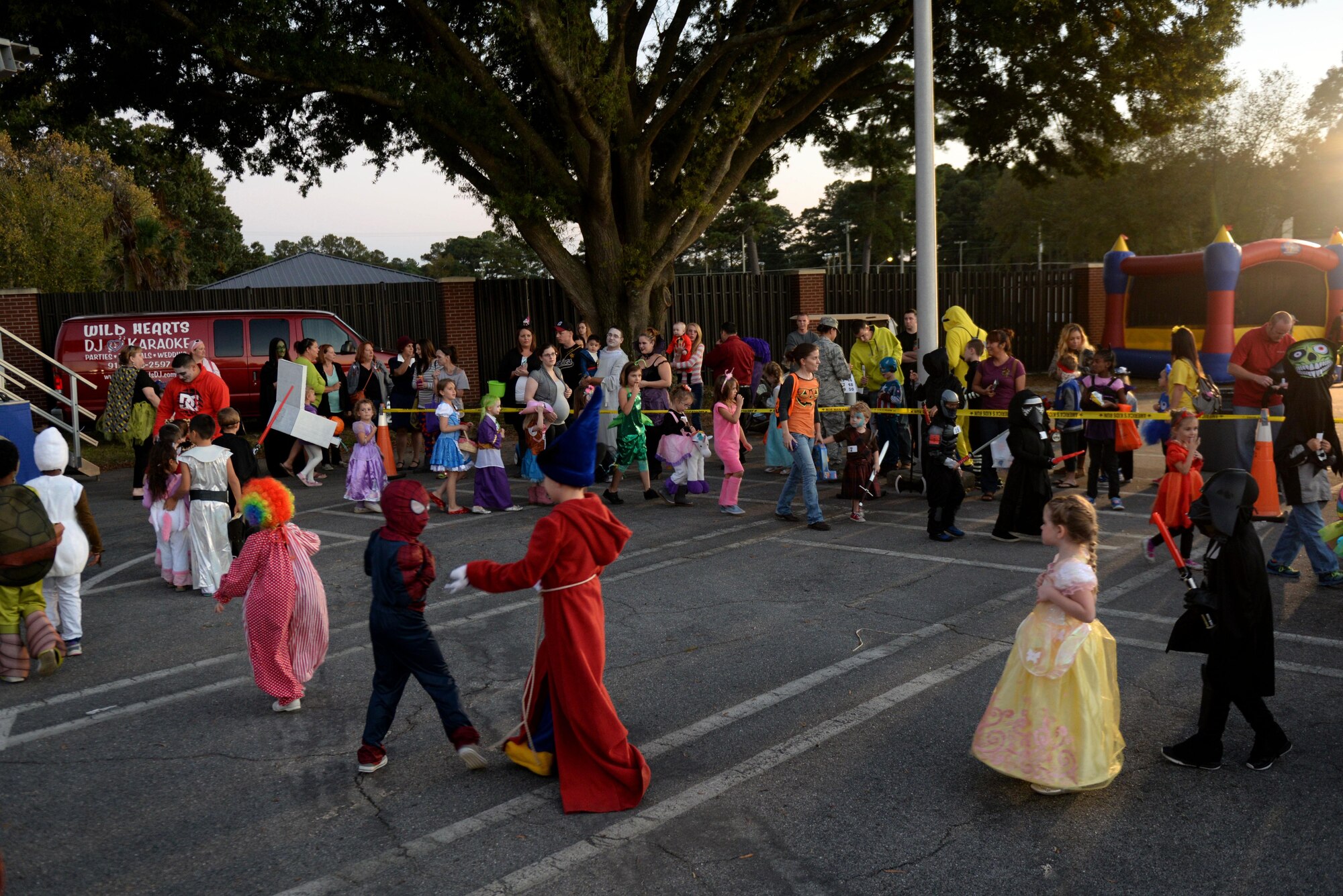 Team Seymour children participate in a costume contest during the Halloween block party, Oct. 30, 2015, at Seymour Johnson Air Force Base, North Carolina. The block party had many activities for kids and adults to participate in, such as costume contests, hay rides and toss games. (U.S. Air Force photo/Airman 1st Class Ashley Williamson)