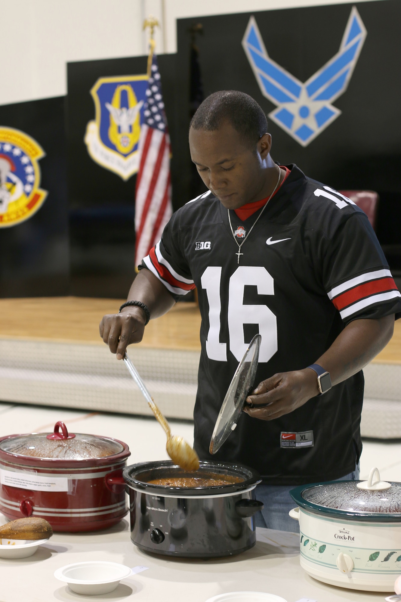 WRIGHT-PATTERSON AIR FORCE BASE, Ohio – Staff Sgt. Christopher Bell, 445th Force Support Squadron customer support journeyman, stirs his pot of chili before judging during the wing’s annual chili cook-off Oct. 29, 2015. The event raised more than $350 for the Combined Federal Campaign. (U.S. Air Force photo/Tech. Sgt. Patrick O’Reilly)