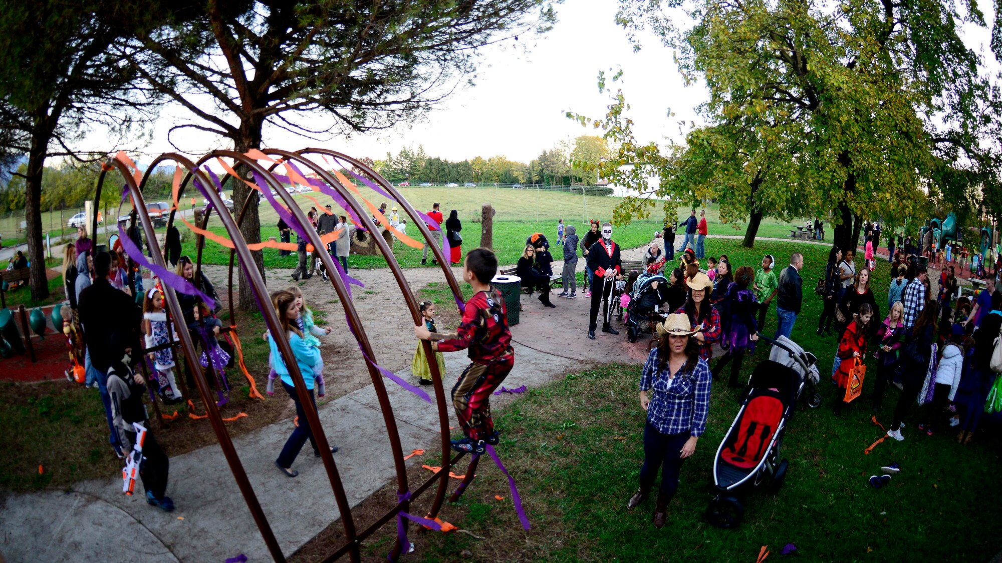 Team Aviano members enjoy Trunk-or-Treat, Oct. 31, 2015, at Aviano Air Base, Italy. The event featured a costume contest, games and a Halloween party. (U.S. Air Force photo by Senior Airman Areca T. Bell/Released)