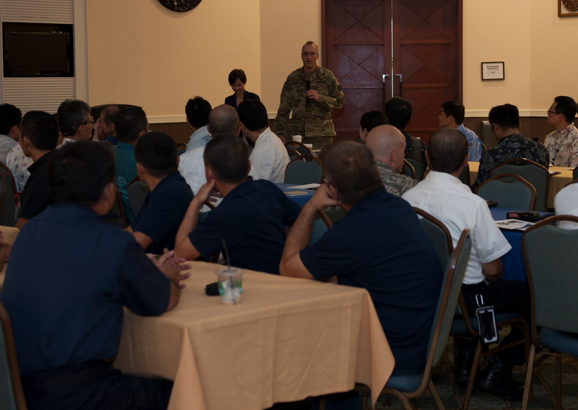 U.S. Army Col. Brady Crosier, Okinawa Area Field Office chief, briefs local Okinawan emergency responders about the importance of the P-3 bilateral training Oct. 29, 2015, at Camp Shields, Japan. Crosier emphasized that this training helps enhance mutual understanding and trust while encouraging the bilateral relationship between the U.S. and Japan. (U.S. Air Force photo by Airman 1st Class Lynette M. Rolen)