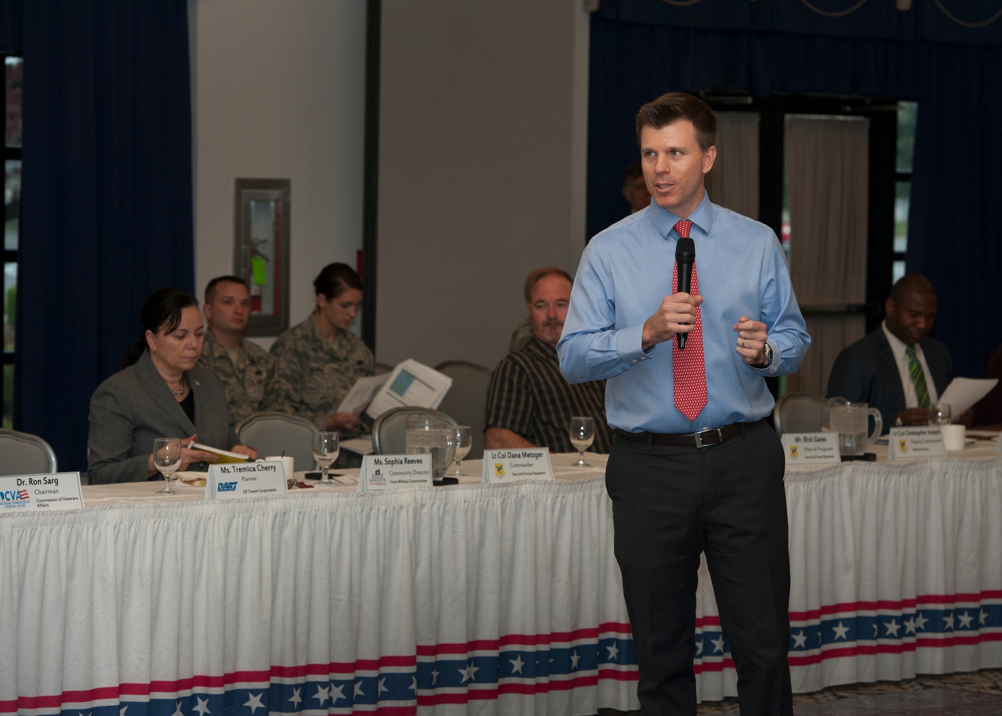 Jason Vandenberg, 436th Mission Support Group deputy director for installation support, speaks at a Team Dover P4 initiative meeting Oct. 28, 2015, at Dover Air Force Base, Del. P4, which stands for Public-Public; Public-Private Partnership, is an Air Force-level program that embraces the use of off-base partnerships to help trim base operating costs. (U.S. Air Force photo/Senior Airman Zachary Cacicia)