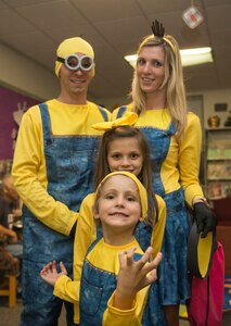 Staff Sgt. Mark Fontana, 437th Aircraft Maintenance Squadron integrated communications, countermeasure and navigation systems craftsman, dressed up with his wife, Alicia , his daughter, Lexi, and his son, Lincoln, for Trunk or Treat at the base library on Joint Base Charleston – Air Base, S.C., on Oct. 30, 2015. Snacks, drinks, arts and crafts and a place to take pictures were provided at the event. (U.S. Air Force photo/Airman 1st Class Thomas Charlton)