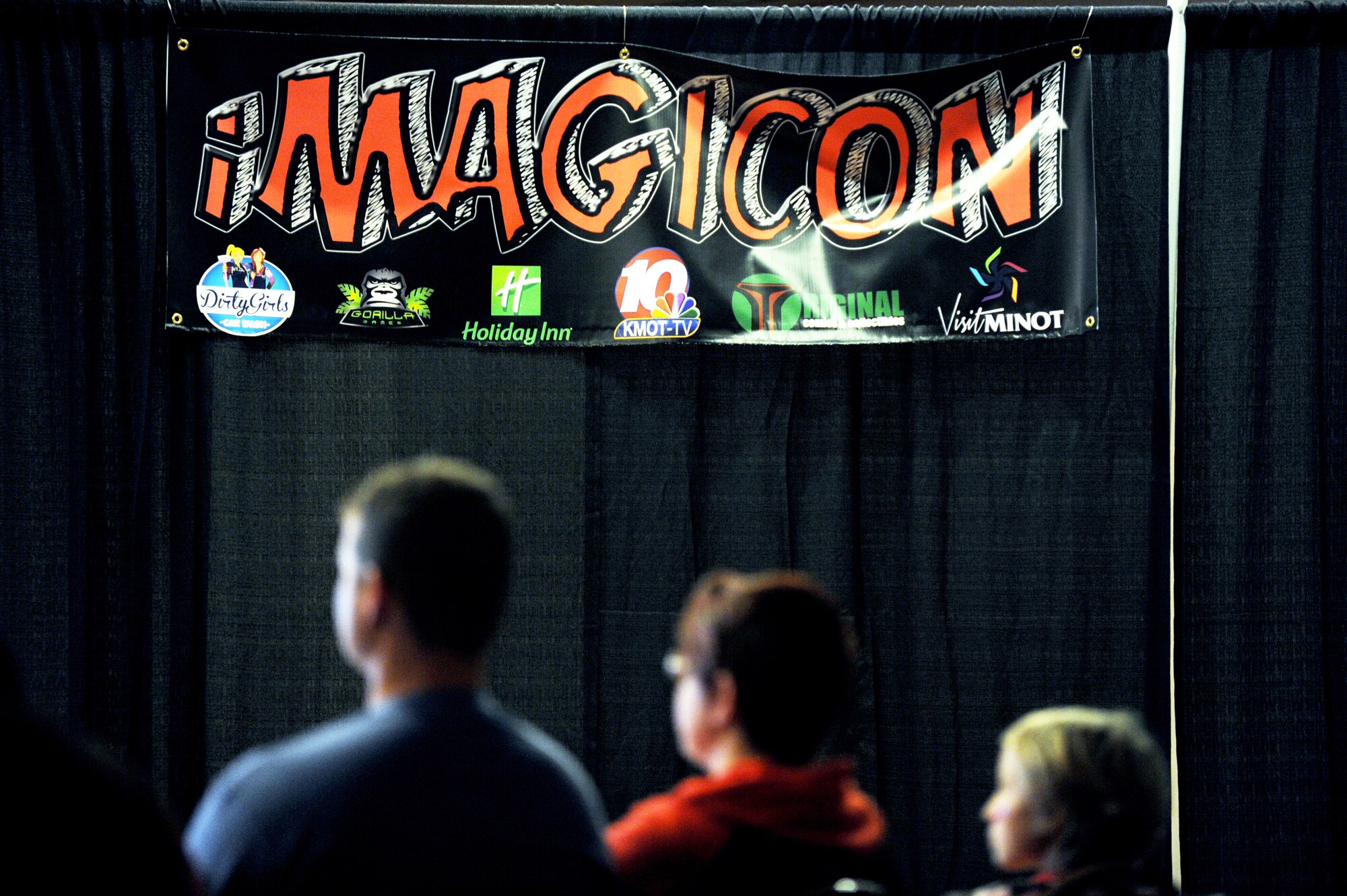 Tech. Sgt. Brent Reimers, 741st Missile Squadron, and his family sit in a panel in iMagicon at Minot, N.D. Oct. 30, 2015. iMagicon is a comic book convention that showcases local filmmakers, local businesses and promotes anything pop culture, with several Airmen from Minot Air Force Base volunteering during the two day event. (U.S. Air Force photo by Staff Sgt. Chad Trujillo)