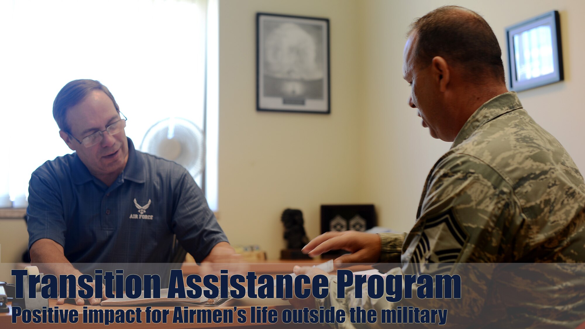 A community readiness specialist at the Airman and Family Readiness Center meets with an airman to discuss retirement planning. The earlier an Airman plans his or her transition, the easier it will be. ( U.S. Air Force illustration by Robert Biermann).