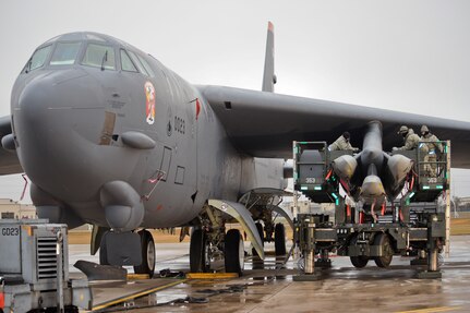 Airmen assigned to the 5th Aircraft Maintenance Squadron load AGM-86/B Air-Launched Cruise Missiles onto the wing of a B-52H Stratofortress at Minot Air Force Base, N.D., Nov. 3, 2015, during Exercise GLOBAL THUNDER 16. The 5th Aircraft Maintenance Squadron is designated as U.S. Strategic Commandâ€™s (USSTRATCOM) Task Force 204 and supports USSTRATCOMâ€™s strategic deterrence and global strike missions by providing combat-ready forces, including long-range, nuclear-capable B-2 Spirit and B-52H Stratofortress bombers. GLOBAL THUNDER is an annual U.S. Strategic Command training event that assesses command and control functionality in all USSTRATCOM mission areas and affords component commands a venue to evaluate their joint operational readiness. Planning for GLOBAL THUNDER 16 has been under way for more than a year and is based on a notional scenario with fictitious adversaries. USSTRATCOM, one of nine DoD unified combatant commands, relies on various task forces for the execution of its global missions, which also include space operations; cyberspace operations; joint electronic warfare; missile defense; intelligence, surveillance and reconnaissance; combating weapons of mass destruction; and analysis and targeting. (U.S. Air Force photo by Airman 1st Class J.T. Armstrong)