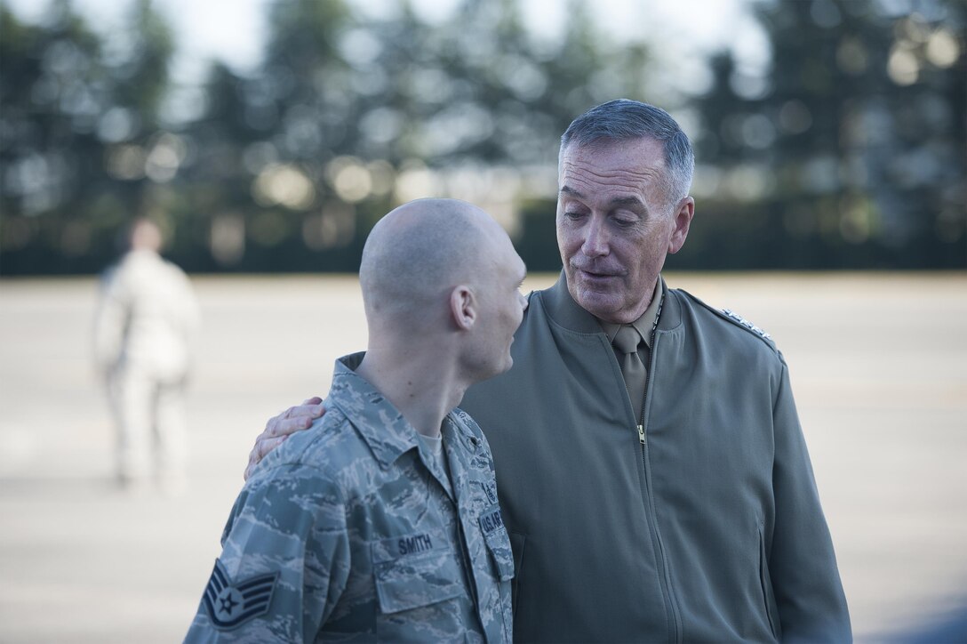 U.S. Marine Corps Gen. Joseph F. Dunford Jr., right, chairman of the Joint Chiefs of Staff, has a meet and greet with airmen assigned the 374th Airlift Wing on Yokota Air Base, Japan, Nov. 4, 2015. DoD photo by U.S. Navy Petty Officer 2nd Class Dominique A. Pineiro