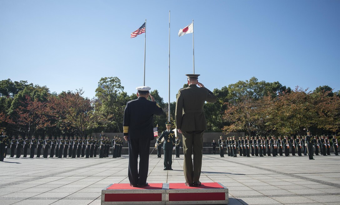 U.S. Marine Corps Gen. Joseph F. Dunford Jr., chairman of the Joint Chiefs of Staff, participates in an honor guard ceremony with Japan Maritime Self-Defense Force Adm. Katsutoshi Kawano, chairman of defense, at the Japan Ministry of Defense in Tokyo, Nov. 4, 2015. DoD photo by U.S. Navy Petty Officer 2nd Class Dominique A. Pineiro