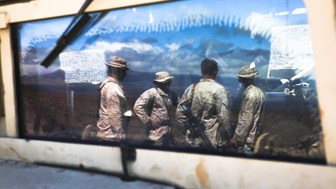 Marines with Weapons Company, 3rd Battalion, 3rd Marine Regiment, standby before a range to fire machine gun and missile systems during exercise Lava Viper, one of the staples of their pre-deployment training, at Pohakuloa Training Area, Hawaii, Oct. 24, 2015. Lava Viper provides the Hawaii-based Marines with an opportunity to conduct various movements, live-fire and tactical training before departing for Integrated Training Exercise at Marine Air-Ground Combat Center Twentynine Palms, Calif., where the battalion will train and be evaluated as a whole. "Trinity" strives to fight and win on both the tactical and ethical battlefield, always cultivating the values of honor, courage, and commitment, ultimately producing morally guided citizens whose obligations and responsibilities supersede rights and privileges.