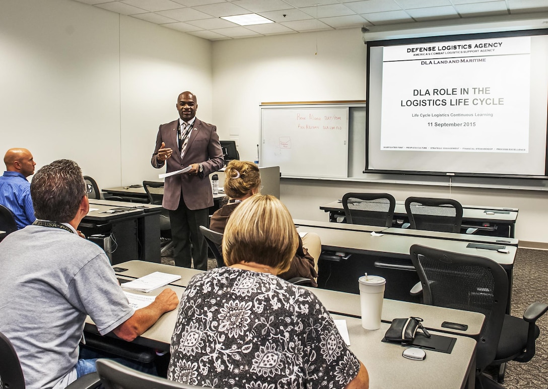 Ken Abrams, Combat Vehicles and Small Arms Division Chief, provides continuous learning training to the Life Cycle Logistics (LCL) workforce.