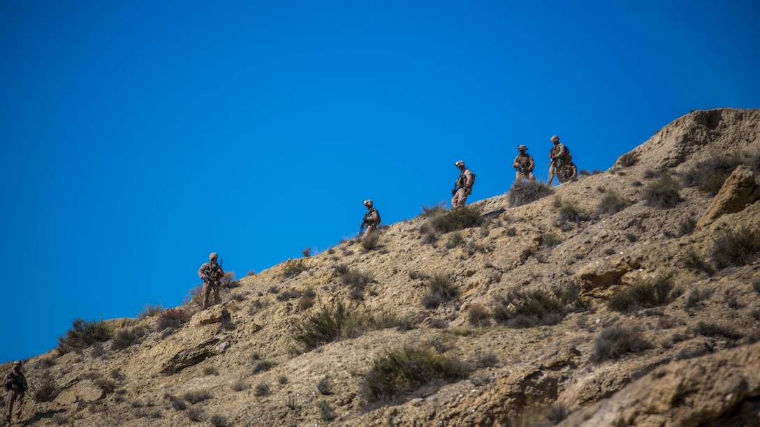 Scouts for 4th Light Armored Reconnaissance Battalion, 4th Marine Division navigate down steep, rocky terrain in Almería, Spain, Oct. 31, 2015, during the final exercise for Trident Juncture 2015. The scouts provide surveillance to the Marines manning the vehicles as well as provide reconnaissance on safe routes to travel and maneuver.