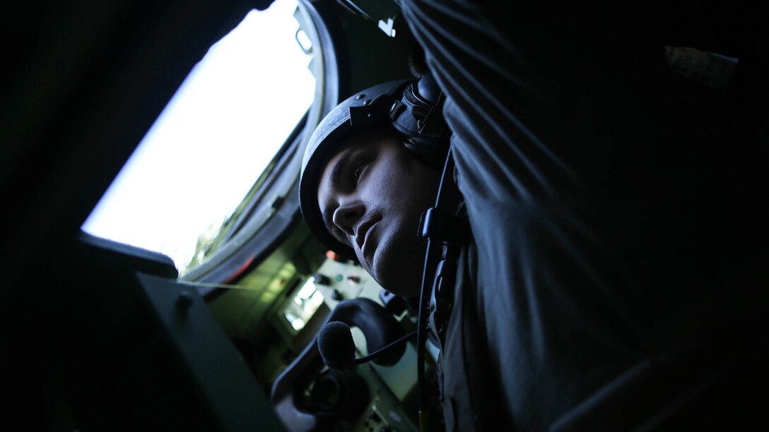 Lance Cpl. Mitchell Davidson, a light armored reconnaissance vehicle gunner with 4th Light Armored Reconnaissance Battalion, 4th Marine Division, helps get his vehicle up and running during exercise Trident Juncture 2015 at Alverez de Sotomayor in Almería, Spain, Oct. 31, 2015. Trident Juncture is the largest NATO exercise to take place within the past 10 years, with over 5,000 U.S. troops participating, along with more than 36,000 troops from more than 30 different nations.