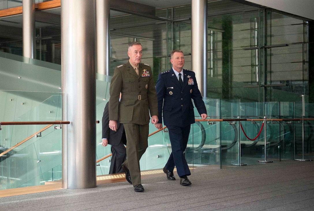 U.S. Marine Corps Gen. Joseph F. Dunford Jr., chairman of the Joint Chiefs of Staff, and U.S. Air Force Lt. Gen. John L. Dolan, commander of U.S. Forces Japan, walk through the official residence of Japanese Prime Minister Shinzo Abe before meeting with him in Tokyo, Nov. 4, 2015. DoD photo by U.S. Navy Petty Officer 2nd Class Dominique A. Pineiro