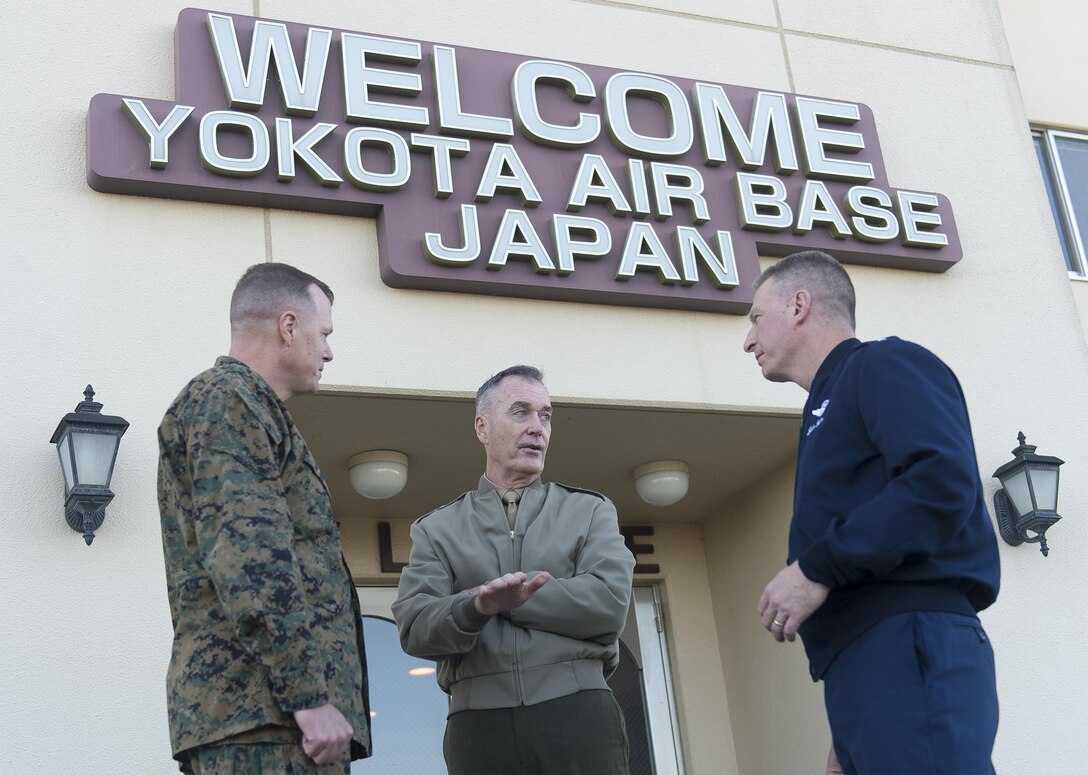 U.S. Marine Corps Gen. Joseph F. Dunford Jr., center, chairman of the Joint Chiefs of Staff, speaks with U.S. Air Force Lt. Gen. John L. Dolan, commander of U.S. Forces Japan, right, and his deputy, U.S. Marine Corps Brig. Gen. Mark Wise, before departing Yokota Air Base, Japan, Nov. 4, 2015. DoD photo by U.S. Navy Petty Officer 2nd Class Dominique A. Pineiro