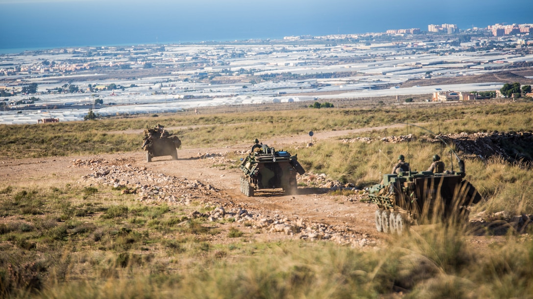 Marines with 4th Light Armored Reconnaissance Battalion, 4th Marine Division, convoy during their final exercise in Trident Juncture, Oct. 28, 2015. The simulated exercise taught the Marines each other’s strengths and weaknesses, allowing them to seek improvement as well as build interoperability among the warfighters.