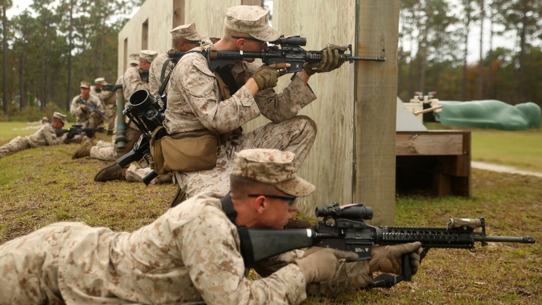 Marines with 1st Battalion, 6th Marine Regiment, assault an objective during a platoon-reinforced attack at Marine Corps Base Camp Lejeune, N.C., Oct. 28, 2015. “To get to this point in training we went with the ‘crawl, walk, then run’ idea. Before this training we did a squad reinforced maneuver range to make sure our guys understood it at that level before moving up,” said 1st Lt. Mark Dela Pena, a platoon commander with the unit. The battalion is conducting this training as they prepare to deploy on the 22nd Marine Expeditionary Unit next year.