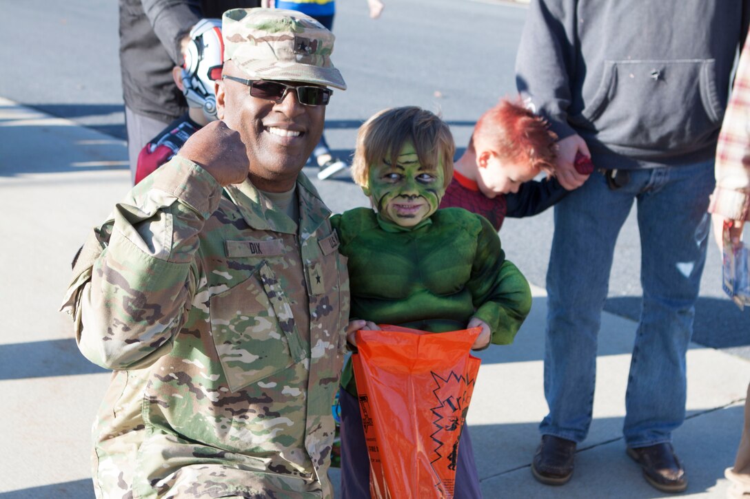 DLA Distribution commander Army Brig. Gen. Richard B. Dix stands with The Hulk during the parade at Defense Distribution Center, Susquehanna on Oct. 30.