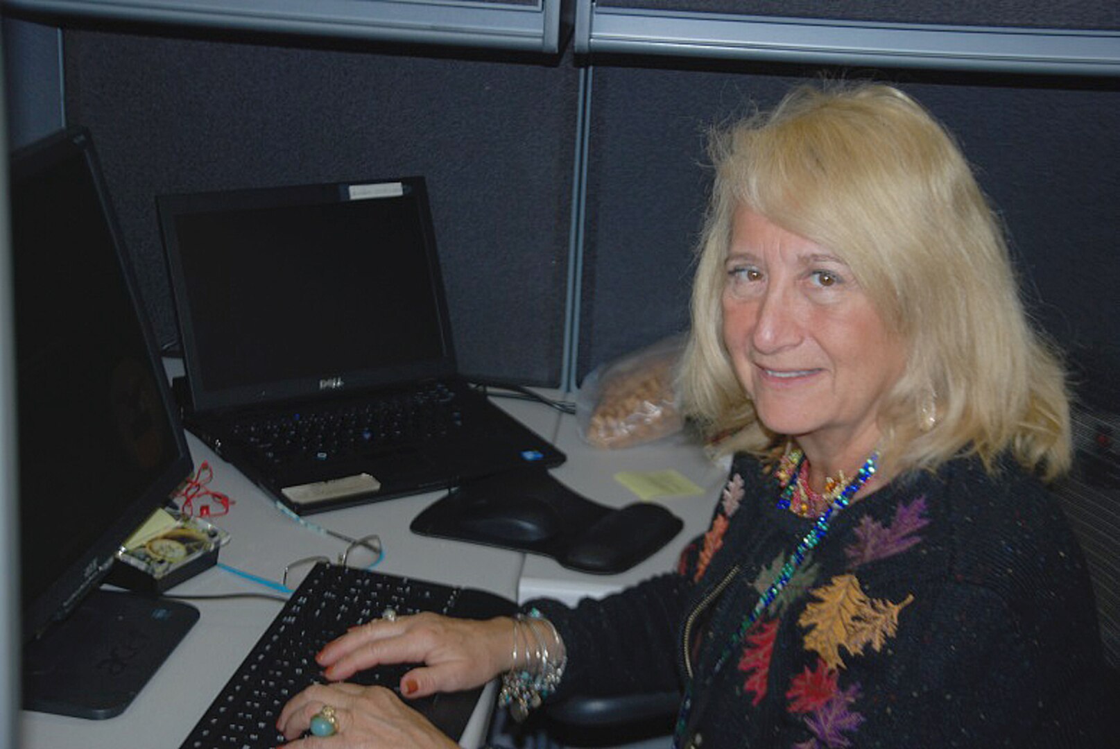 Defense Logistics Agency Energy Administrative Assistant Barbara Burger poses for a photograph in her new position in the Command Administration Support office as part of the six-month rotation program.