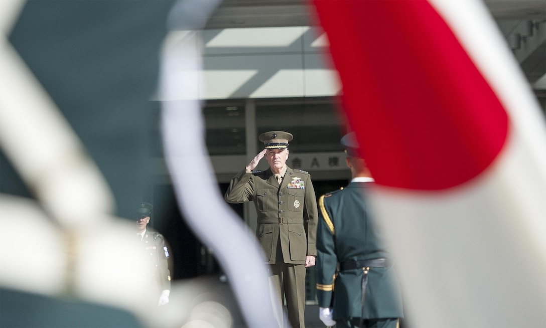 U.S. Marine Corps Gen. Joseph F. Dunford Jr., chairman of the Joint Chiefs of Staff, is welcomed to the Japanese ministry of defense with a full-honors ceremony hosted by Japan Maritime Self- Defense Force Adm. Katsutoshi Kawano, chairman of defense, in Tokyo, Nov. 4, 2015. DoD photo by U.S. Navy Petty Officer 2nd Class Dominique A. Pineiro