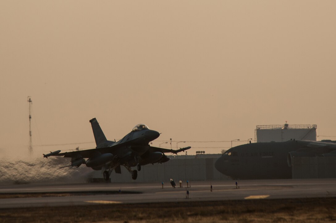 U.S. Air Force Capt. Tyler McBride takes off in an F-16 Fighting Falcon aircraft on his first combat sortie mission from Bagram Airfield, Afghanistan, Oct. 30, 2015. Bride is a pilot assigned to the 421st Expeditionary Fighter Squadron. U.S. Air Force photo by Tech. Sgt. Joseph Swafford